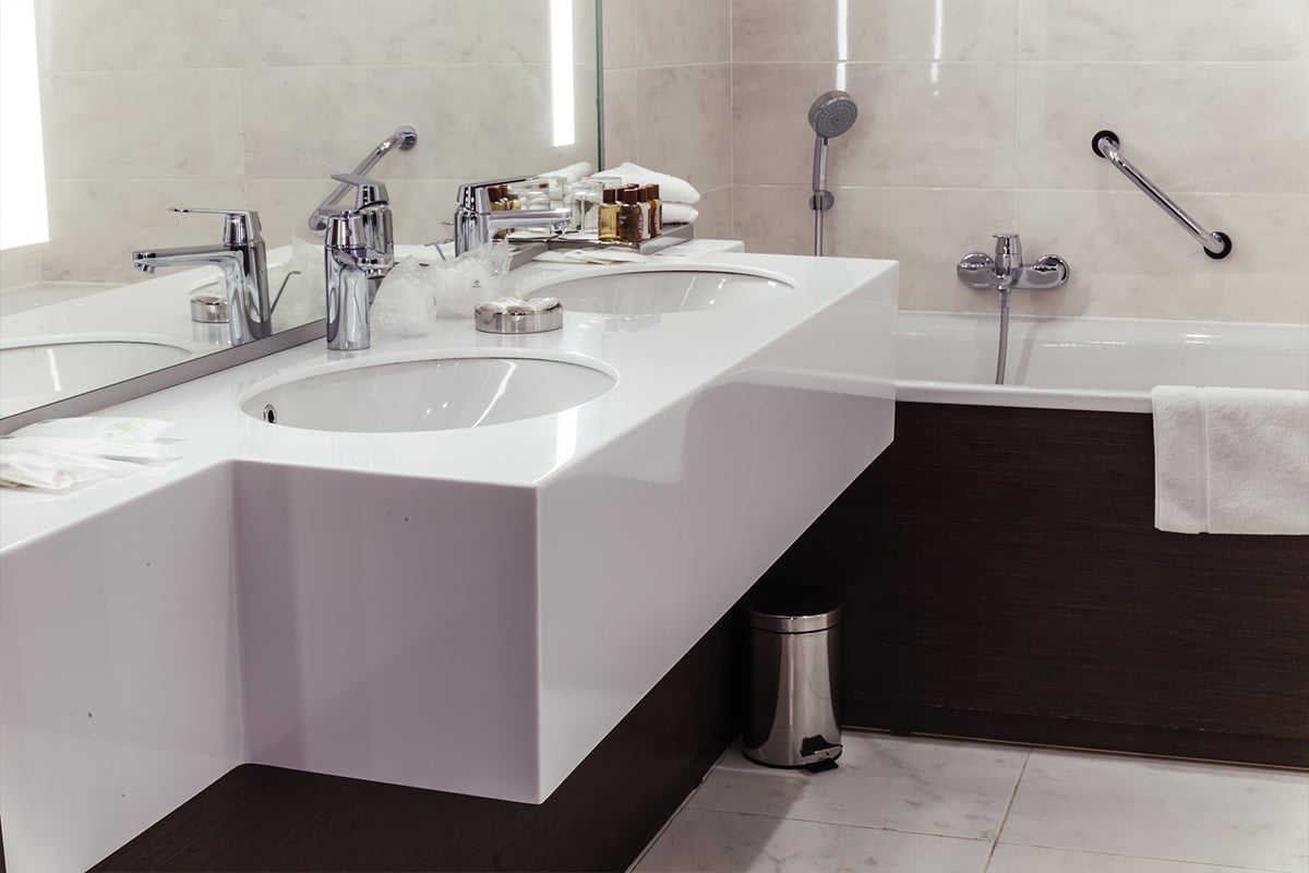 Modern warm designer bathroom with shower tiling 1200x800