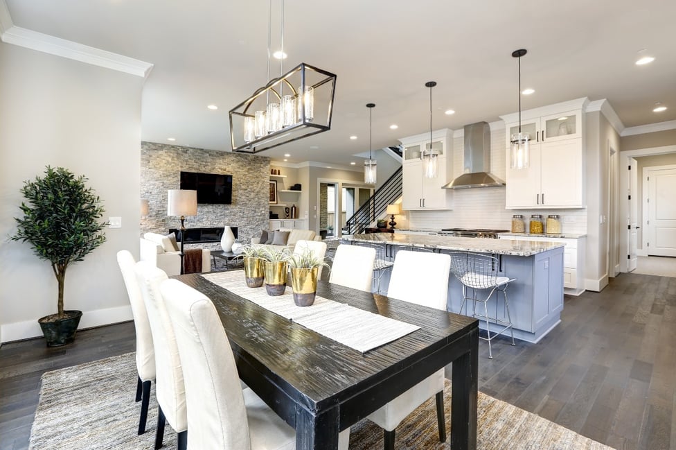 Beautiful kitchen in luxury modern contemporary home interior with island and chairs 1200x800px